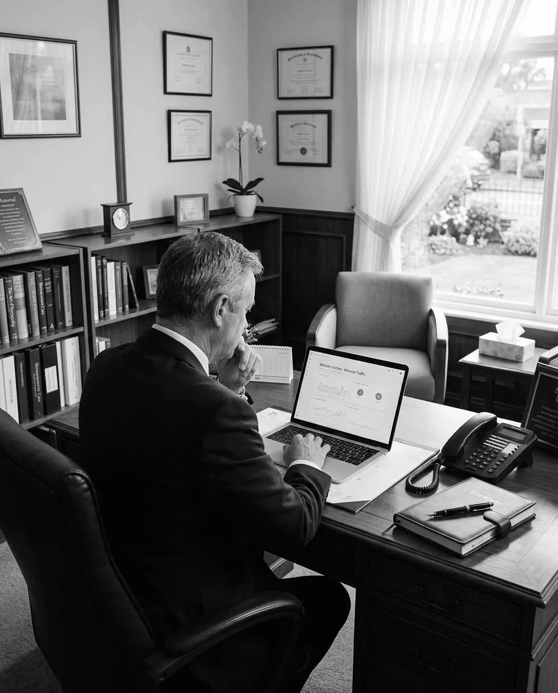 Funeral director reviewing online visibility and marketing performance